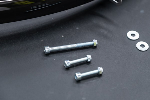 2 bolts on a bench of different length